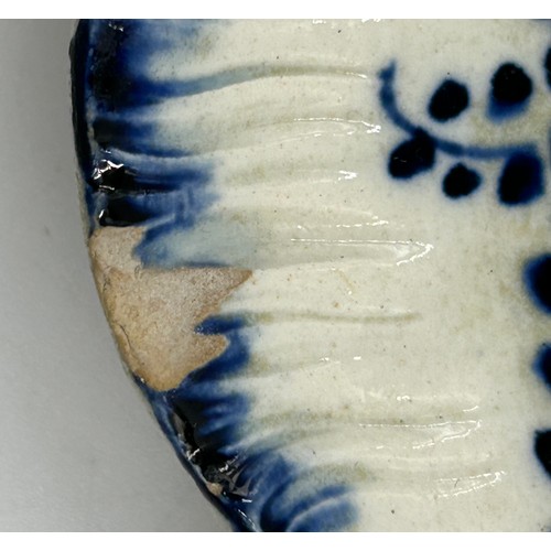 221 - A group of early 19th century blue and white hand-painted pearlware shell edge Chinese floral design... 