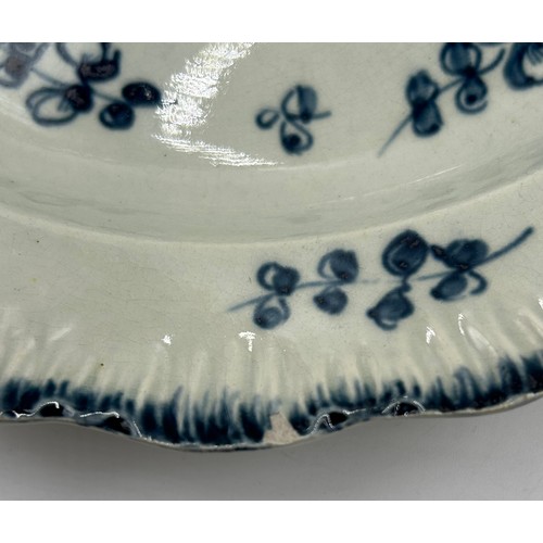 221 - A group of early 19th century blue and white hand-painted pearlware shell edge Chinese floral design... 