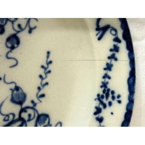 222 - A group of early 19th century blue and white hand-painted pearlware shell edge floral design plates,... 