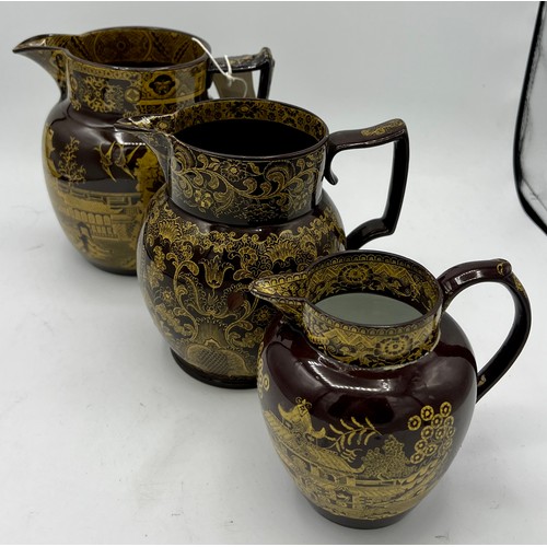 230 - A group of early 19th century yellow printed brown glaze jugs, c. 1805-10. To include Fig Tree, Nels... 