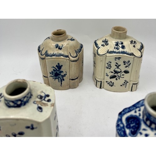 231 - A group of early 19th century blue painted pearlware moulded tea caddies, c. 1810. One has initials ... 