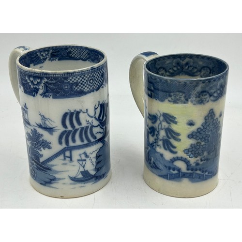 235 - A group of early 19th century blue and white transfer-printed chinoiserie pattern mugs, c. 1800-10. ... 