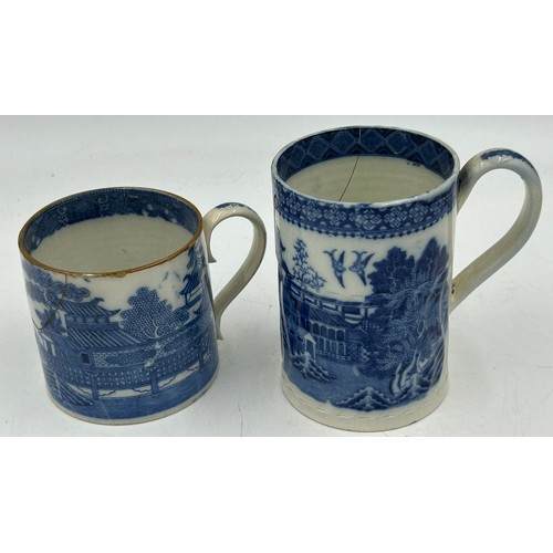 235 - A group of early 19th century blue and white transfer-printed chinoiserie pattern mugs, c. 1800-10. ... 