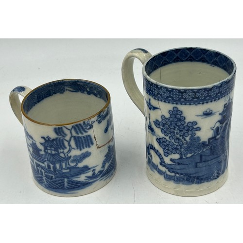 235 - A group of early 19th century blue and white transfer-printed chinoiserie pattern mugs, c. 1800-10. ... 