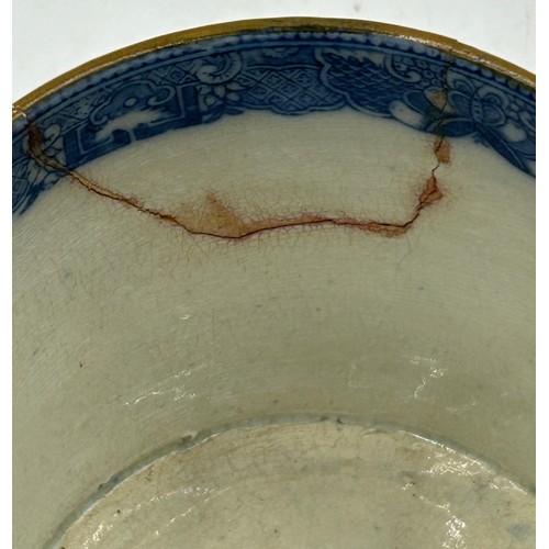 235 - A group of early 19th century blue and white transfer-printed chinoiserie pattern mugs, c. 1800-10. ... 