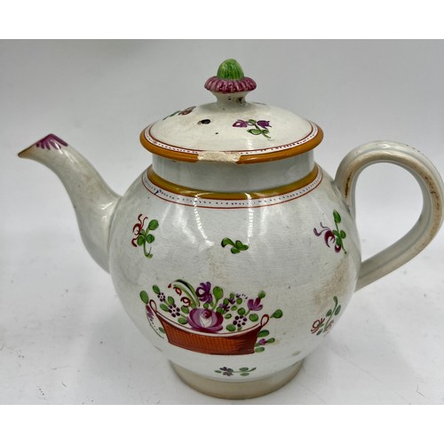 240 - A group of early 19th century hand-painted pearlware teapots, c. 1810. One is decorated with a peafo... 