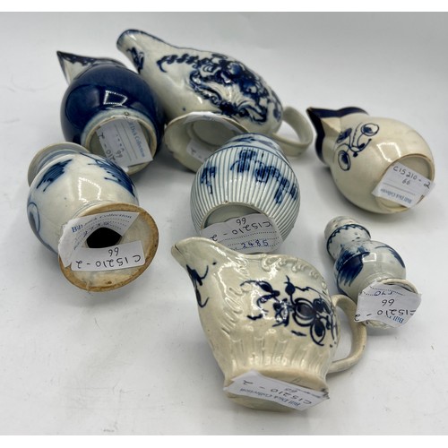 242 - A group of early 19th century blue hand-painted pearlware miniatures, c. 1810. To include: two sparr... 