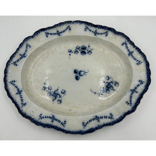 270 - Three early 19th century blue and white hand-painted, shell edge platters, one with a Chinese figure... 