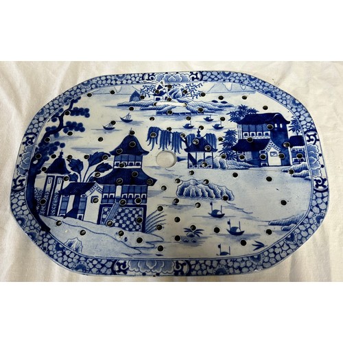 271 - Two early 19th century blue and white transfer-printed iron stone chinoiserie pattern drainers, poss... 