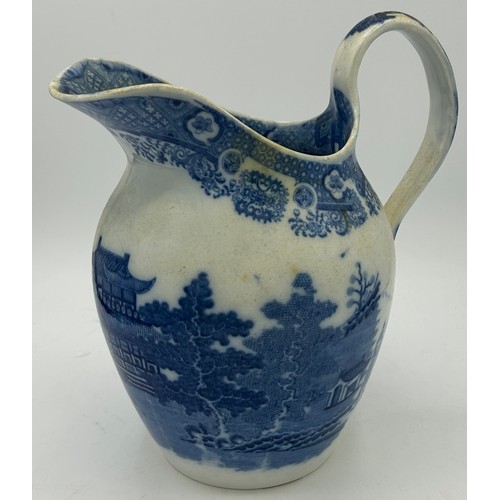 273 - An early 19th century Spode blue and white transfer-printed Rock pattern ewer, a Lucano tankard and ... 