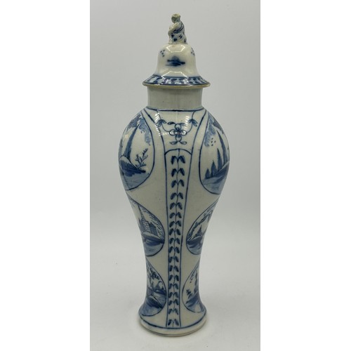 274 - An early 19th century hand-painted blue and white pearlware large lidded vase, c. 1800. It has paint... 