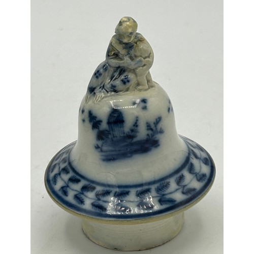 274 - An early 19th century hand-painted blue and white pearlware large lidded vase, c. 1800. It has paint... 