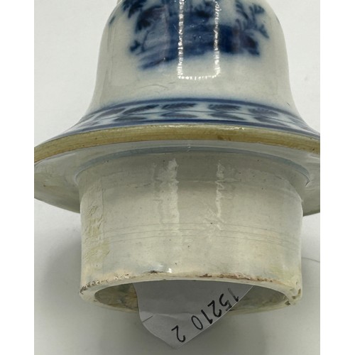 274 - An early 19th century hand-painted blue and white pearlware large lidded vase, c. 1800. It has paint... 