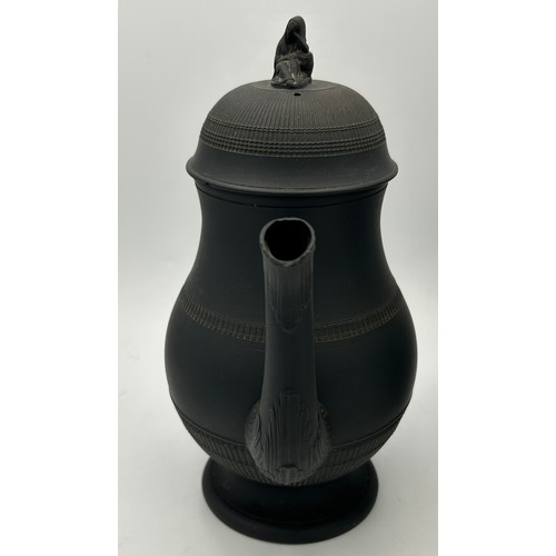 285 - A group of early 19th century engine turned black basalt wares, c. 1810. To include two lidded coffe... 