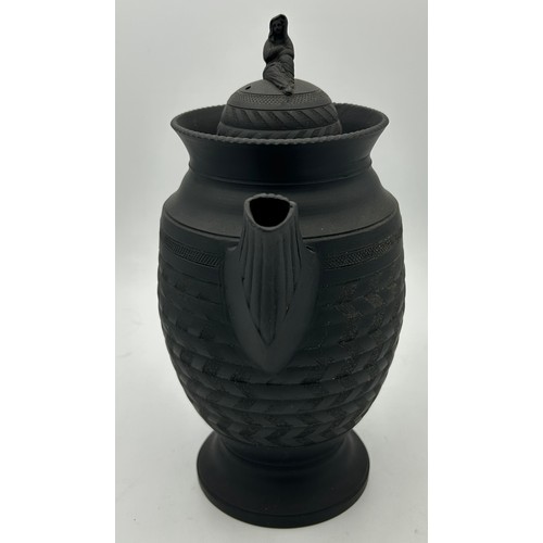 285 - A group of early 19th century engine turned black basalt wares, c. 1810. To include two lidded coffe... 