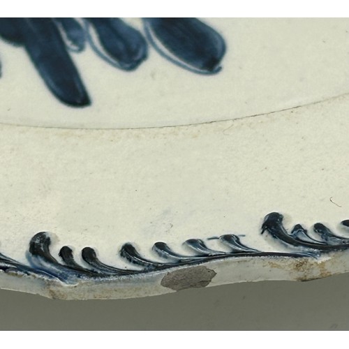 293 - A group of early 19th century blue and white hand-painted pearlware shell edge plates with Long Eliz... 