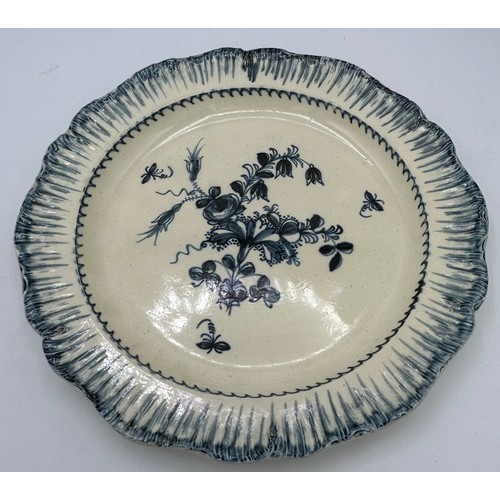 294 - A group of early 19th century blue and white hand-painted pearlware shell edge plates with floral de... 