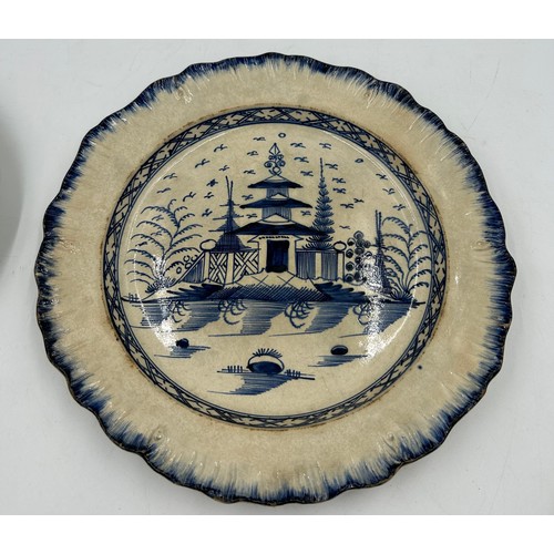 295 - A group of early 19th century blue and white hand-painted pearlware shell edge plates with chinoiser... 