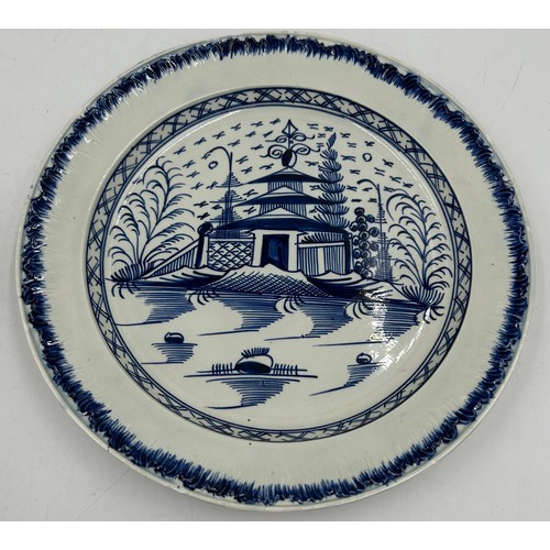 295 - A group of early 19th century blue and white hand-painted pearlware shell edge plates with chinoiser... 