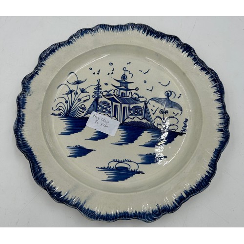 295 - A group of early 19th century blue and white hand-painted pearlware shell edge plates with chinoiser... 