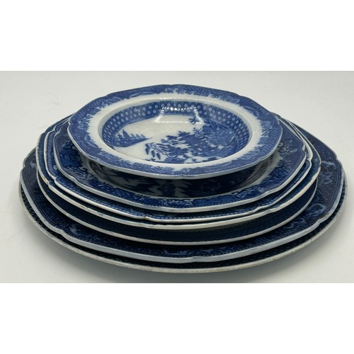 299 - A group of early 19th century blue and white transfer-printed chinoiserie pattern plates, c. 1800. T... 