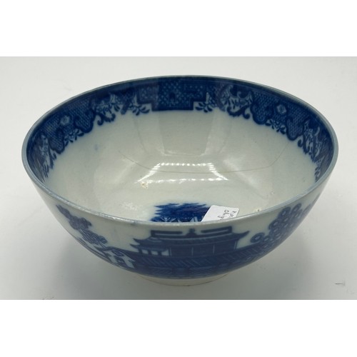 302 - A group of early 19th century blue and white transfer-printed bowls, c. 1800-20. To include: Convers... 