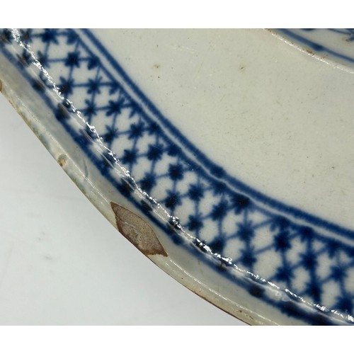 306 - Two early 19th century blue and white hand-painted, shell edge platters, one with a Chinese figure, ... 