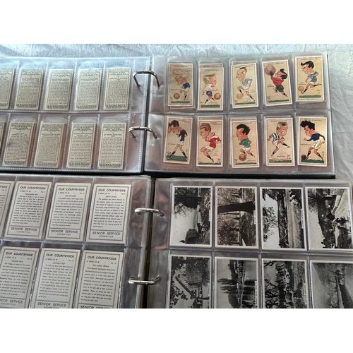 1003 - A large collection of Cigarette cards in 7 x albums the majority complete sets including Cavanders, ... 