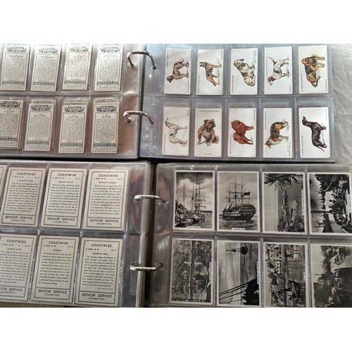 1003 - A large collection of Cigarette cards in 7 x albums the majority complete sets including Cavanders, ... 