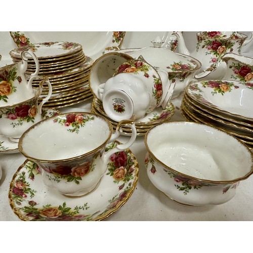 446 - A Royal Albert Country Roses part dinner and tea service to include 1x meat plate measuring 35cm, 6x... 