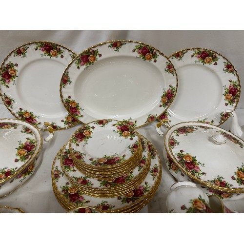 446 - A Royal Albert Country Roses part dinner and tea service to include 1x meat plate measuring 35cm, 6x... 