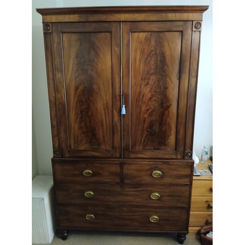 141 - A 19thC mahogany press with three drawers to base and original slides to interior. 125cm w x 58cm x ... 