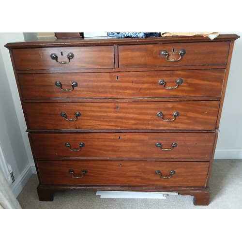 142 - A 19thC mahogany chest of two short over four long drawers on bracket feet with brass swan necked ha... 