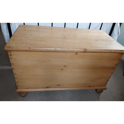 152 - A 19thC pine blanket box on bun feet. 90cm x 46cm x 63cm h.