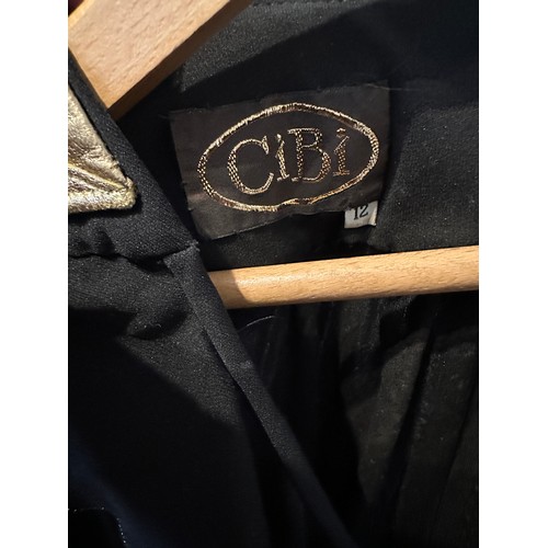 945 - A collection of CiBi vintage costume labelled made in England to include, a gold leather faux crocod... 