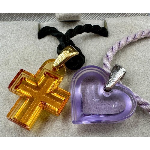 524 - Two Lalique necklaces one an Amoureuse Beaucoup small lilac heart on a lilac cord with silver bale s... 