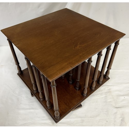 96 - An Edwardian mahogany tabletop rotating bookcase. 34cm squared x 31cm high.