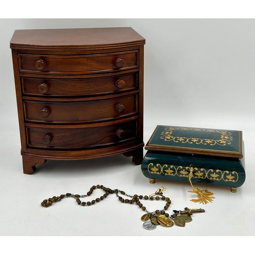 1066 - A miniature bow fronted mahogany jewellery chest with 4 drawers 23.5cm x 14cm to include an Italian ... 