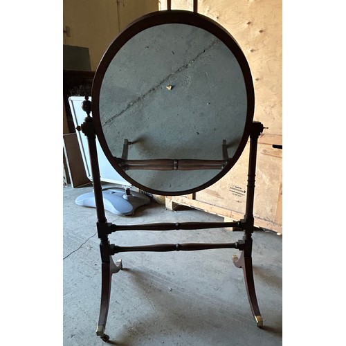 16 - A mahogany cheval mirror.
157cm h x 96cm w x 66cm d.