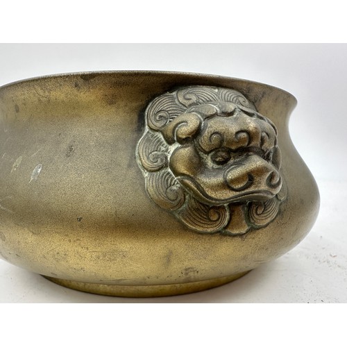 1037 - Two oriental bronze bowls with marks to base and a vase decorated with chrysanthemums 15cm h.