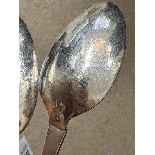 930 - A pair of .925 silver spoons, maker Georg Jensen Weight 129gm. Length 20.5cm.