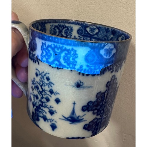 235 - A group of early 19th century blue and white transfer-printed chinoiserie pattern mugs, c. 1800-10. ... 