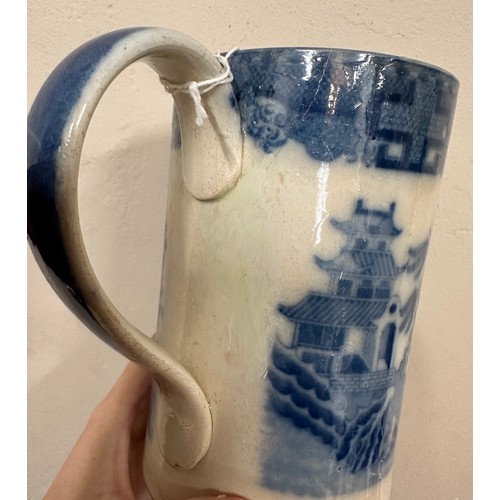 235 - A group of early 19th century blue and white transfer-printed chinoiserie pattern mugs, c. 1800-10. ... 