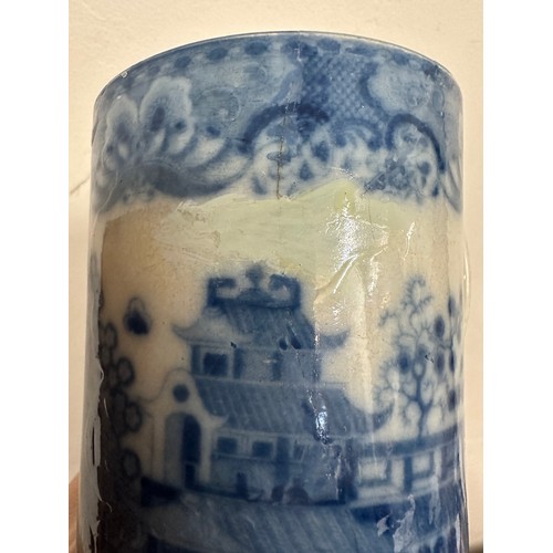 235 - A group of early 19th century blue and white transfer-printed chinoiserie pattern mugs, c. 1800-10. ... 