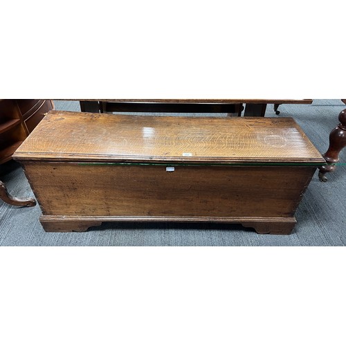 102 - A 19thC oak blanket box with candle box to interior. 128cm l x 40.5cm d x 49.5cm h.