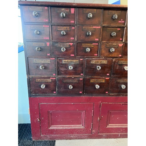 64 - Nineteenth century drug run/drawers, multiple drawers over cupboards to base. 268cm l x 137cm h x 30... 