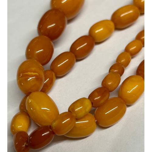 582 - Six strings of vintage amber beads.
Butterscotch necklace 31gms.