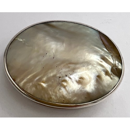 78 - A Georgian white metal and mother of pearl oval snuff box. 5cm x 4cm.