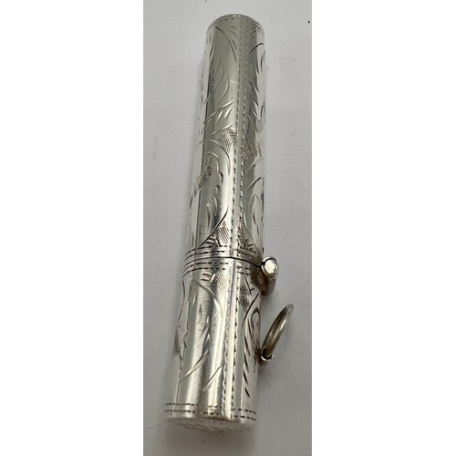 196 - A sterling silver needle case with etched decoration on a suspension ring. 6.5cm l.