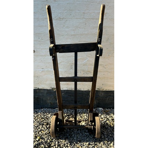 265 - An early 20thC wood and metal sack barrow. 123cm h.